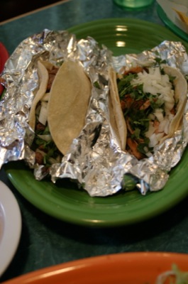 Tacos the way we like them...corn tortillas, cilantro, onions.